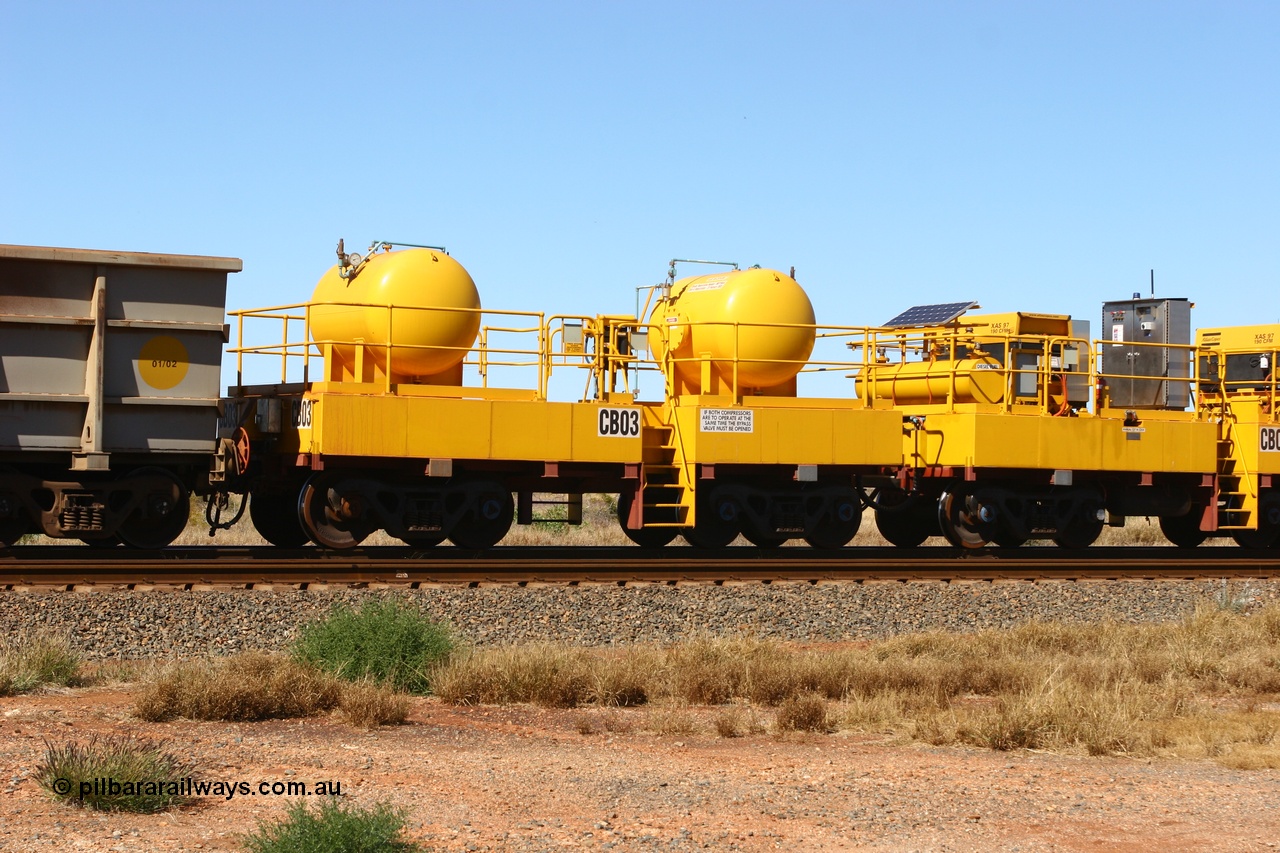 060723 7763
Rio Tinto compressor waggon set CB 03, receiver waggon with two air tanks or receivers. These are built on former ore waggons that have been cut down. Seen here just outside of 7 Mile. 23rd July 2006.
Keywords: CB03;rio-compressor-waggon;