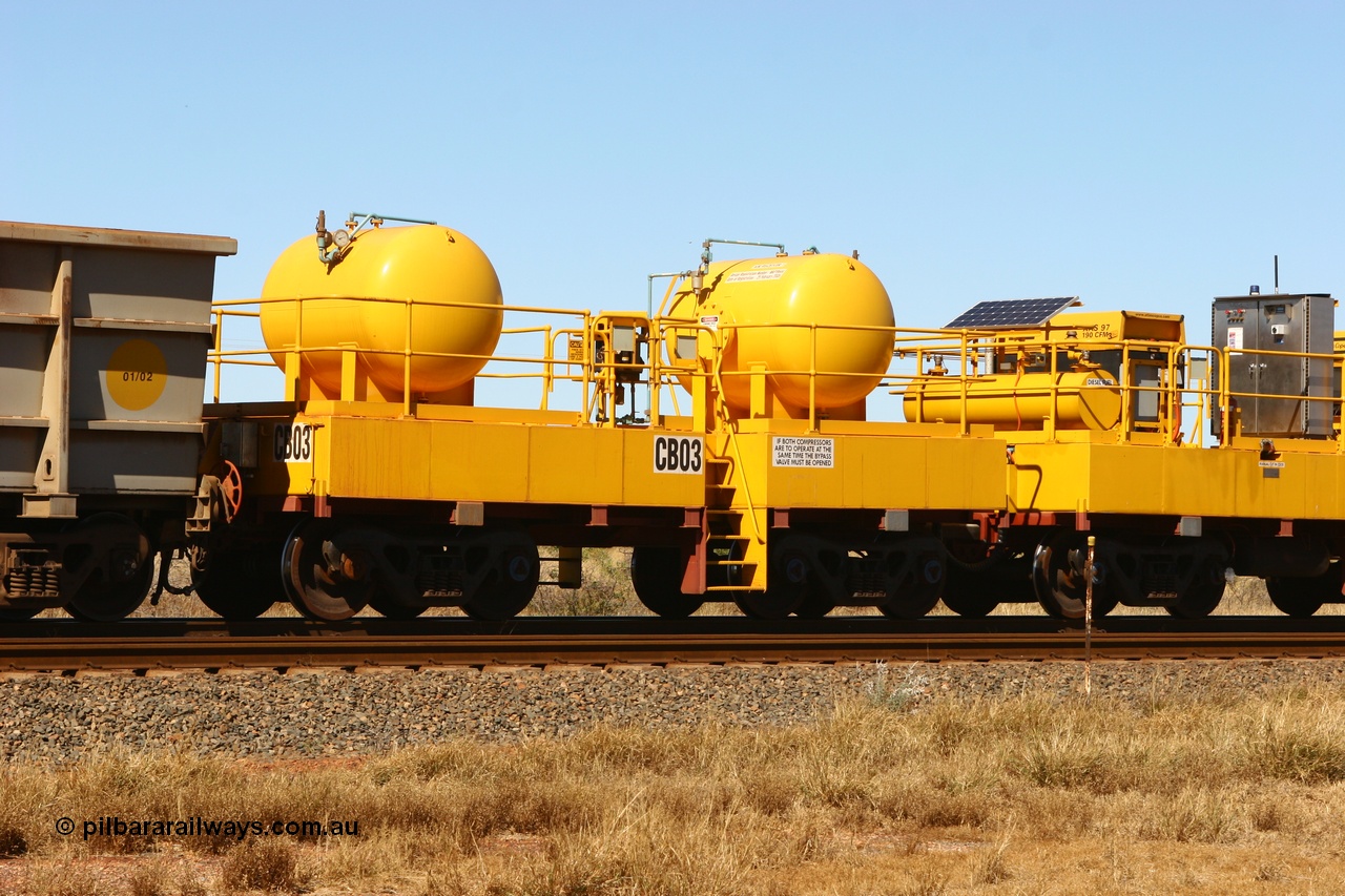 060723 7764
Rio Tinto compressor waggon set CB 03, receiver waggon with two air tanks or receivers. These are built on former ore waggons that have been cut down. Seen here just outside of 7 Mile. 23rd July 2006.
Keywords: CB03;rio-compressor-waggon;