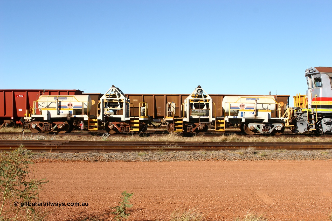 060723 7841
Original Hamersley Iron compressor waggon sets IC-1 and IC-3 which were made from cutting down condemned ore waggons and then fitting Atlas Copco XAS 97 air compressors, receiver tanks and fuel tanks. The compressors have been fitted to a swing cradle to limit the in-train forces during the unloading process. 7 Mile 23rd July 2006.
Keywords: IC-1;IC-3;rio-compressor-waggon;