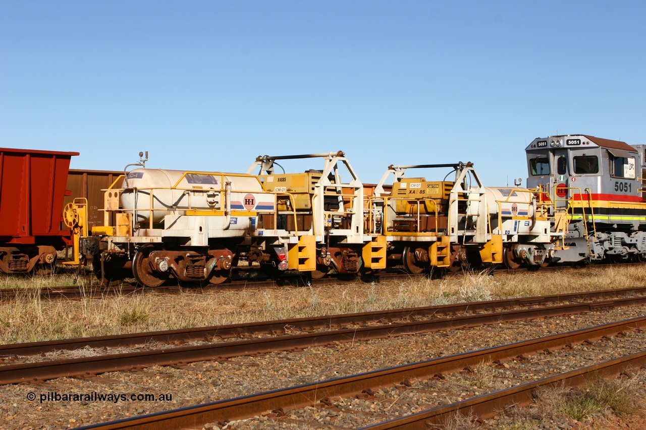 060723 7845
Original Hamersley Iron compressor waggon sets IC-1 and IC-3 which were made from cutting down condemned ore waggons and then fitting Atlas Copco XAS 97 air compressors, receiver tanks and fuel tanks. The compressors have been fitted to a swing cradle to limit the in-train forces during the unloading process. 7 Mile 23rd July 2006.
Keywords: IC-1;IC-3;rio-compressor-waggon;