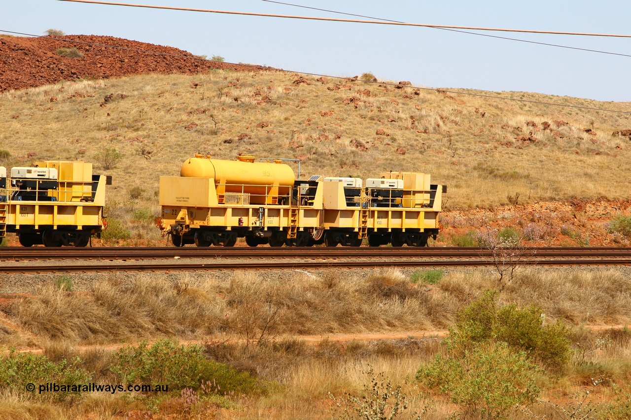 070908 0595
Robe River compressor waggon set IC 22 with air receiver and IC 23 with two Ingersoll Rand air compressors. These waggons are ballasted to 100 tonnes each and are modified ore waggons. Cape Lambert 8th August 2007.
Keywords: IC22;IC23;robe-compressor-waggon;