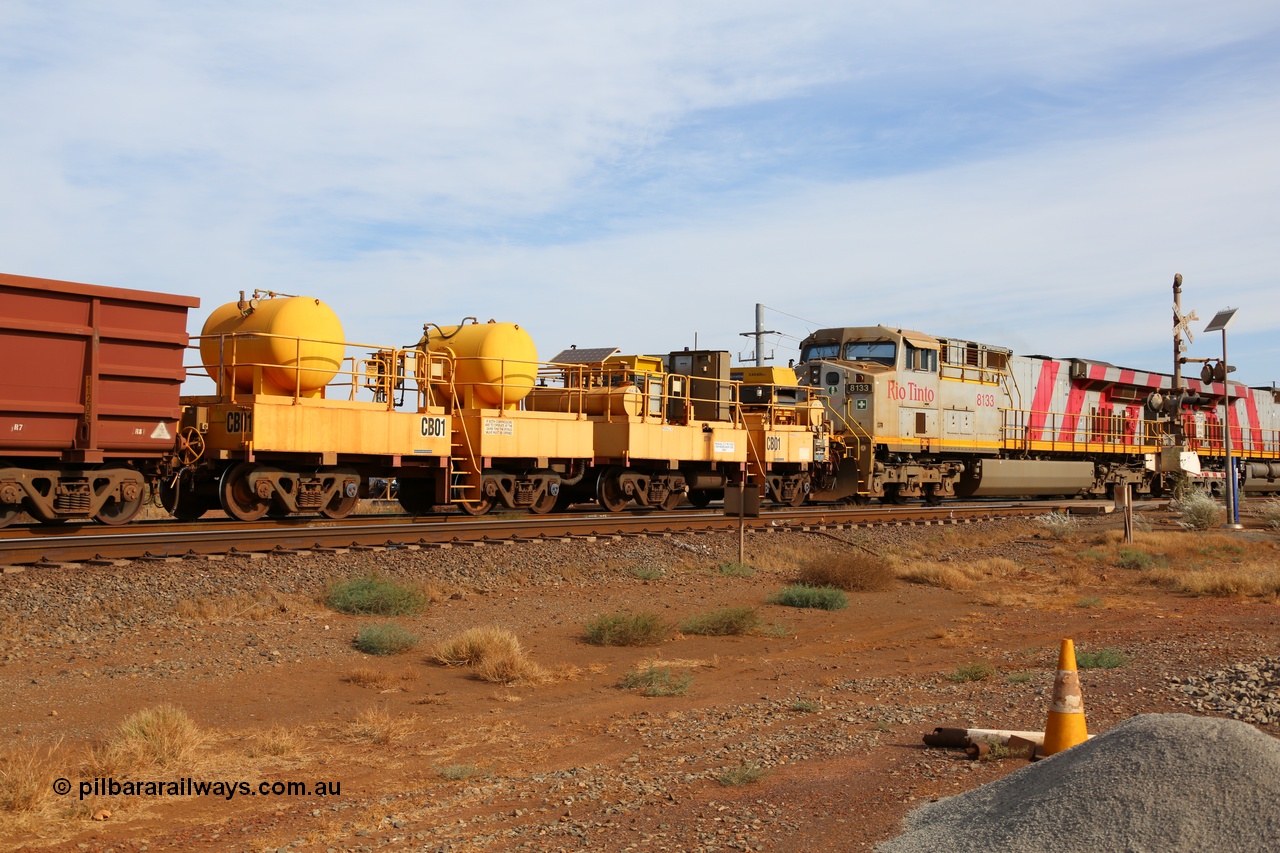 141124 7092
Rio Tinto compressor waggon set leader CB 01, compressor control waggon with two diesel powered Atlas Copco XAS 97's behind the loco and the receiver waggon with two air tanks or receivers. Note the waggons are cut down ore waggons. Seen here at 7 Mile, Dampier on 24th November 2014.
Keywords: CB01;rio-compressor-waggon;