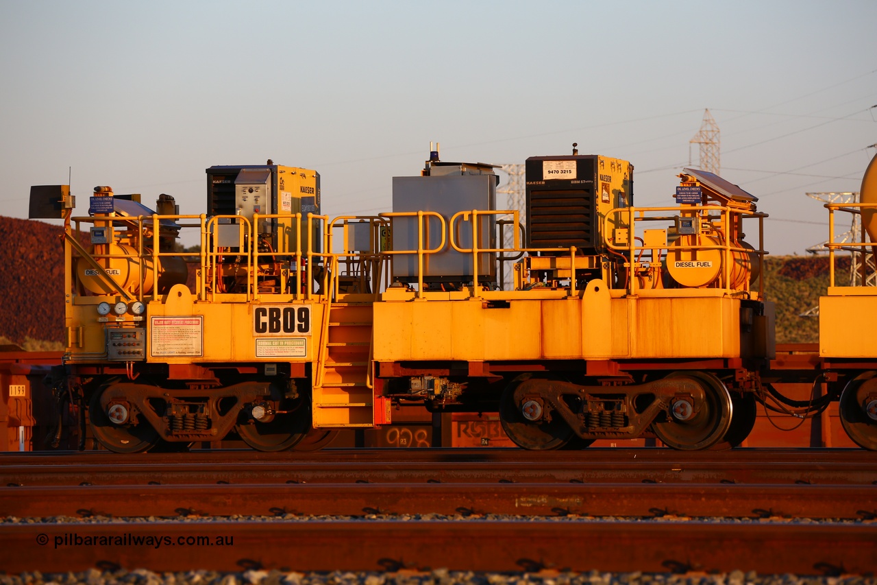 170510 8293
Rio Tinto compressor waggon set CB 09, compressor control waggon with two diesel powered Kaeser M57 Utility air compressors. Note the waggons are modified ore waggon frames. Seen here at Cape Lambert. 10th May 2017.
Keywords: CB09;rio-compressor-waggon;