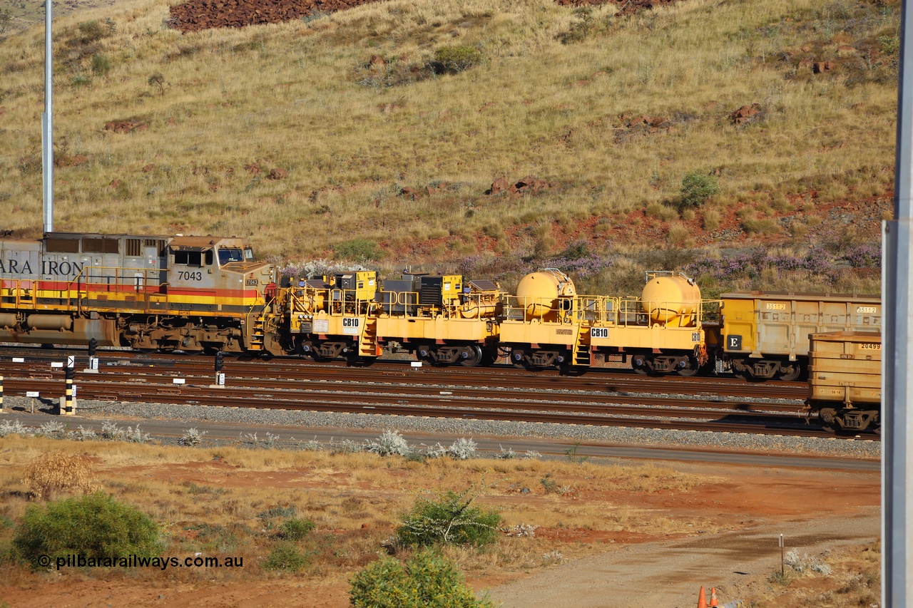 170729 0088
Rio Tinto compressor waggon set CB 10, compressor control waggon with two diesel powered Kaeser M57 Utility air compressors and the receiver waggon with two air tanks or receivers. Note the waggons are modified ore waggon frames. Seen here at Cape Lambert. 29th July 2017.
Keywords: CB10;rio-compressor-waggon;