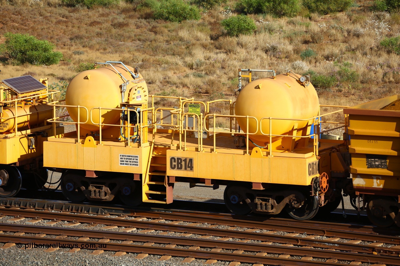 170729 0107
Rio Tinto compressor waggon set CB 14, receiver waggon with two air tanks or receivers. Note the waggons are modified ore waggon frames. Seen here at Cape Lambert. 29th July 2017.
Keywords: CB14;rio-compressor-waggon;