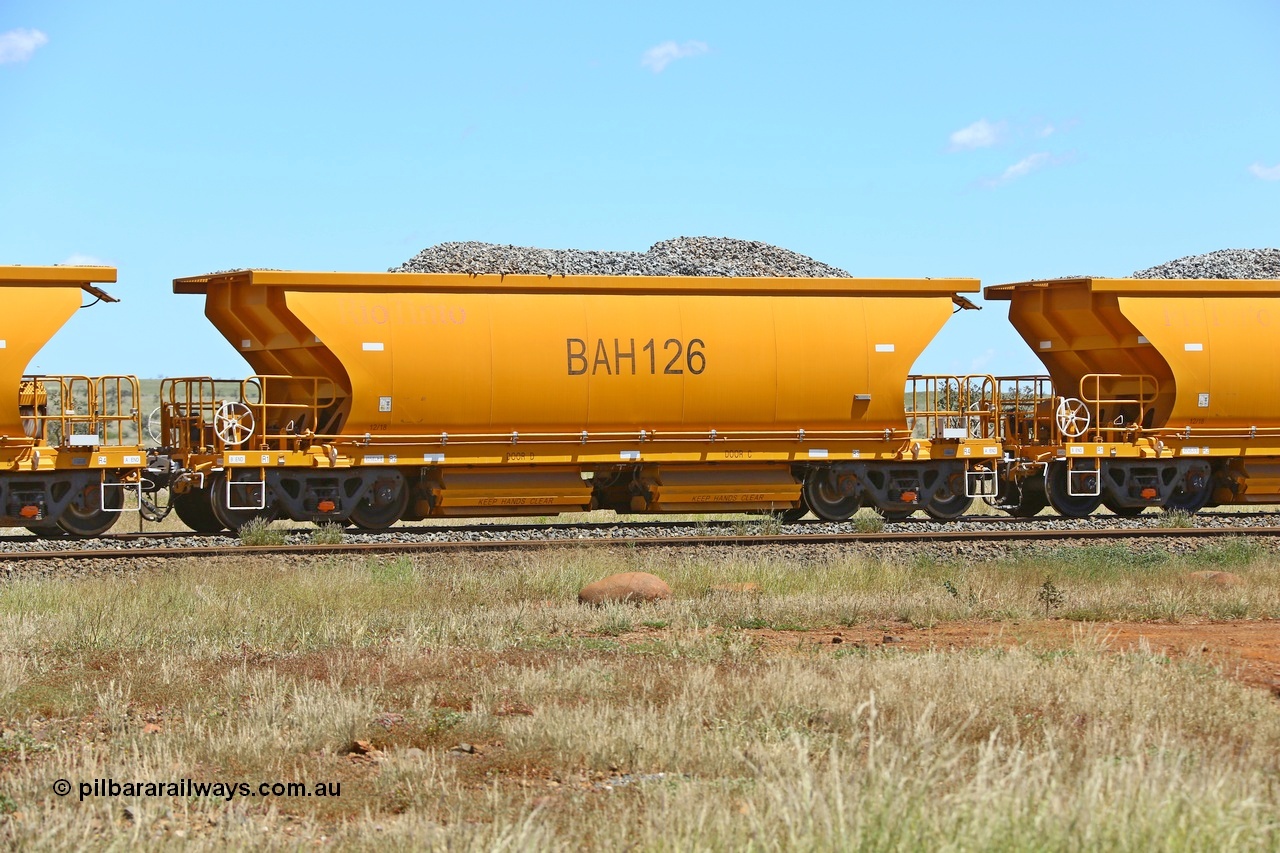 210322 9567
Near Gecko on Rio Tinto's Dampier - Tom Price line is Chinese built ballast waggon BAH 126 on a loaded ballast rake. Location is roughly [url=https://goo.gl/maps/XZkGLreipQwHrTjw9]here[/url]. 22nd March 2021.
Keywords: BAH-type;BAH126;Rio-ballast-waggon;