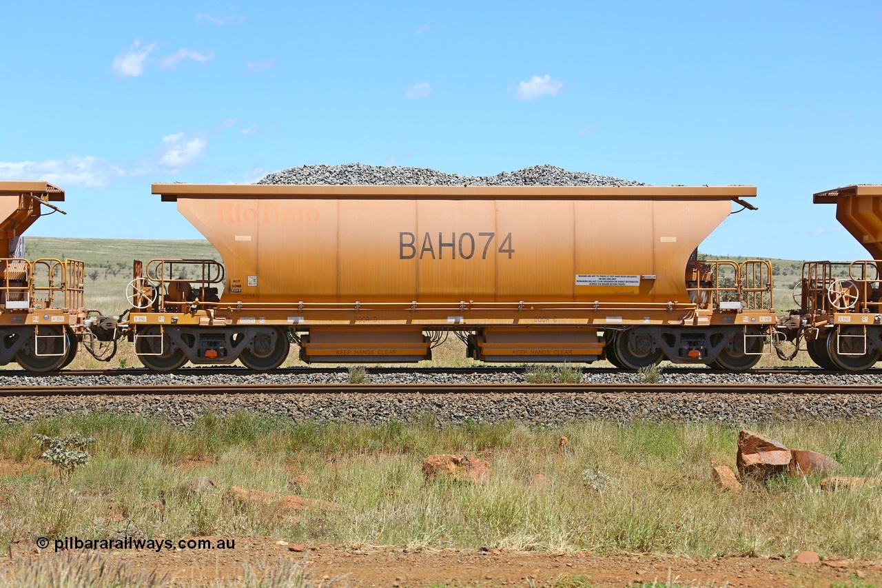 210322 9573
Near Gecko on Rio Tinto's Dampier - Tom Price line is Chinese built ballast waggon BAH 074 on a loaded ballast rake. Location is roughly [url=https://goo.gl/maps/XZkGLreipQwHrTjw9]here[/url]. 22nd March 2021.
Keywords: BAH-type;BAH074;Rio-ballast-waggon;