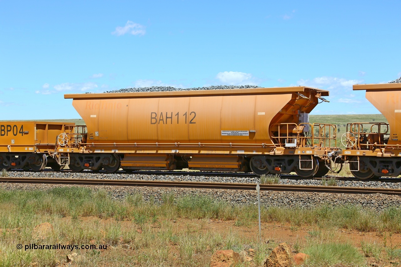 210322 9581
Near Gecko on Rio Tinto's Dampier - Tom Price line is Chinese built ballast waggon BAH 112 on a loaded ballast rake. Location is roughly [url=https://goo.gl/maps/XZkGLreipQwHrTjw9]here[/url]. 22nd March 2021.
Keywords: BAH-type;BAH112;Rio-ballast-waggon;
