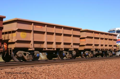 1995-6997 050828 5307
Lyre Siding, empty Hamersley Iron Bradken built S series waggon pair 6997 slave and 1995 control built in July 2003. August 28, 2005.
Keywords: 1995;6997;S-series;Bradken-Rail-Qld;Rio-ore-waggon;