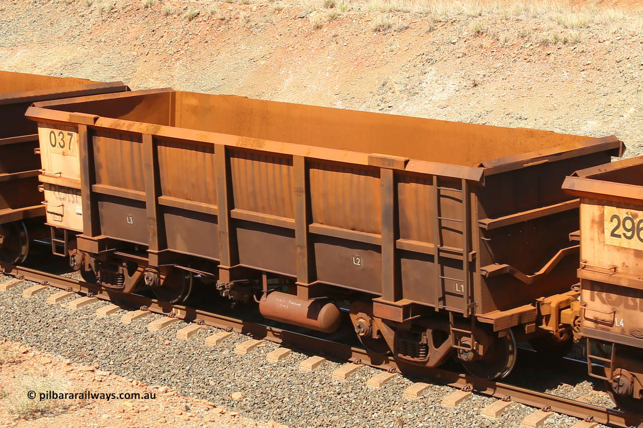 0037 160306 1277
Robe River ore waggon 037, built by Centurion Industries WA, fixed coupler non-handbrake side empty view with 'drop rib' and Centurion Industries waybill holder, suspected replacement built body, at Greenpool on the Cape Lambert line. March 6, 2016.
Keywords: 037;Centurion-Industries-WA;Robe-ore-waggon;