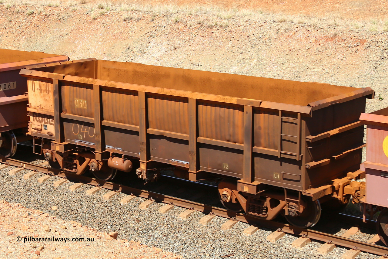0040 160306 1291
Robe River ore waggon 040, built by Nippon Sharyo Nihon, fixed coupler non-handbrake side empty view at Greenpool on the Cape Lambert line. March 6, 2016.
Keywords: 040;Nippon-Sharyo-Nihon;Robe-ore-waggon;