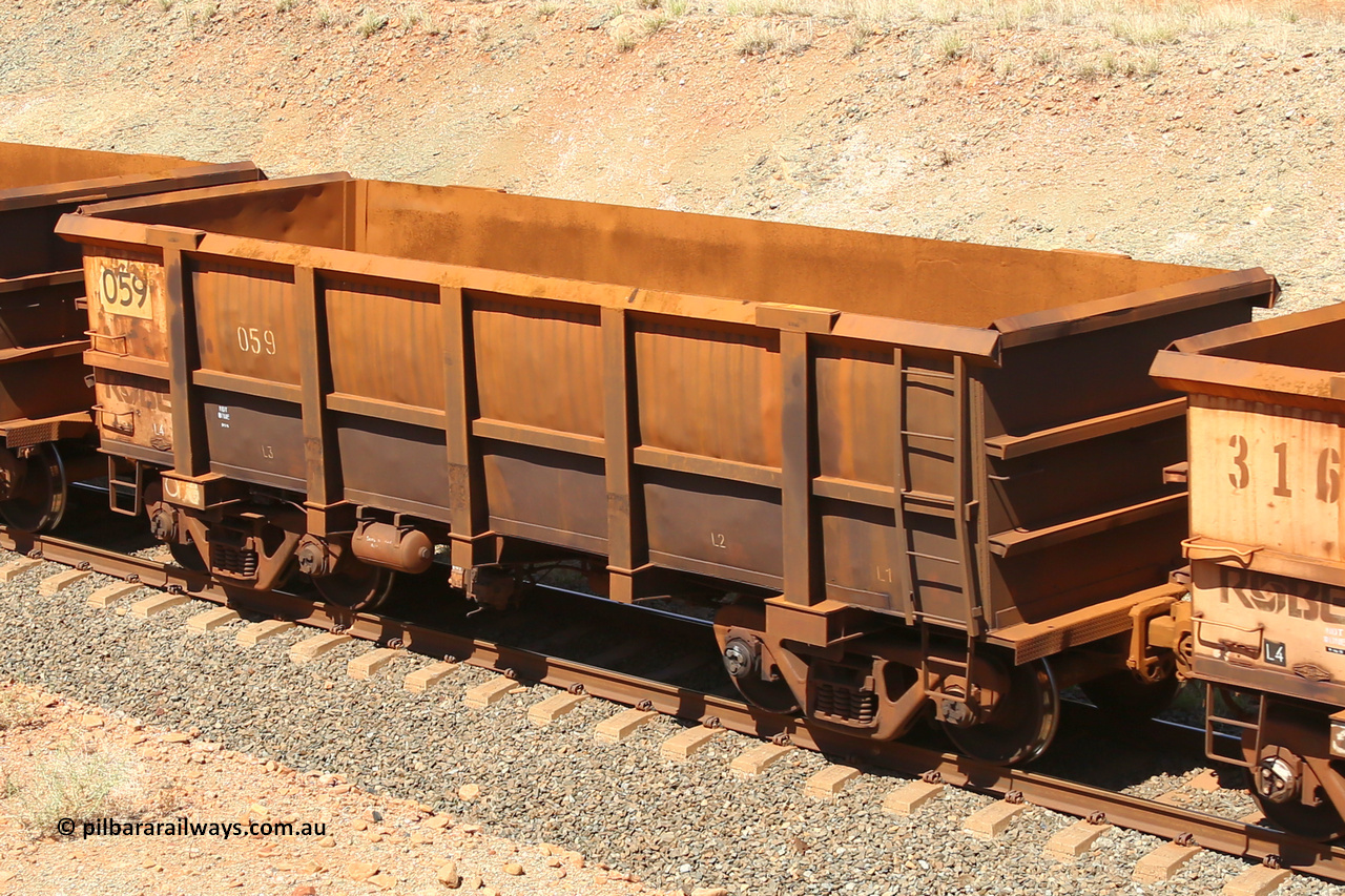 0059 160306 1325
Robe River ore waggon 059, built by Nippon Sharyo Nihon, fixed coupler non-handbrake side empty view at Greenpool on the Cape Lambert line. March 6, 2016.
Keywords: 059;Nippon-Sharyo-Nihon;Robe-ore-waggon;