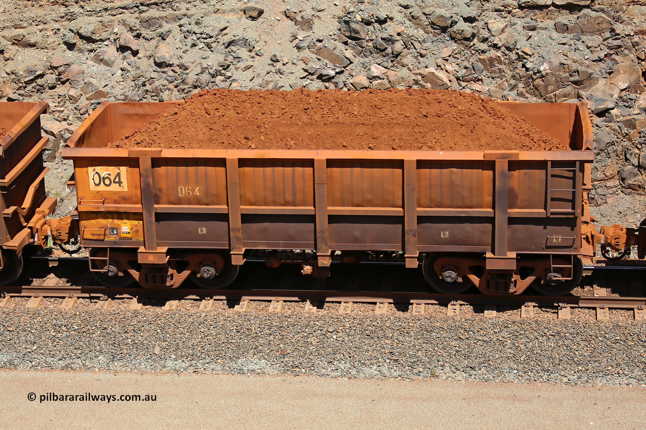 0064 160306 1548
Robe River ore waggon 064, built by Nippon Sharyo Nihon, fixed coupler non-handbrake side loaded view at the 45 km, Harding Siding on the Cape Lambert line. March 6, 2016.
Keywords: 064;Nippon-Sharyo-Nihon;Robe-ore-waggon;