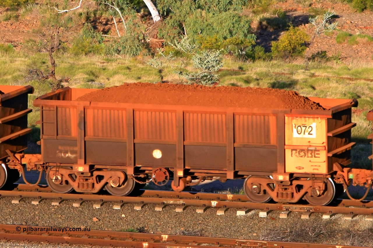 0072 110602 1627
Robe River ore waggon 072, built by Nippon Sharyo Nihon, rotary coupler end handbrake side loaded view at the 71 km, Western Creek on the Deepdale line. June 2, 2011.
Keywords: 072;Nippon-Sharyo-Nihon;Robe-ore-waggon;
