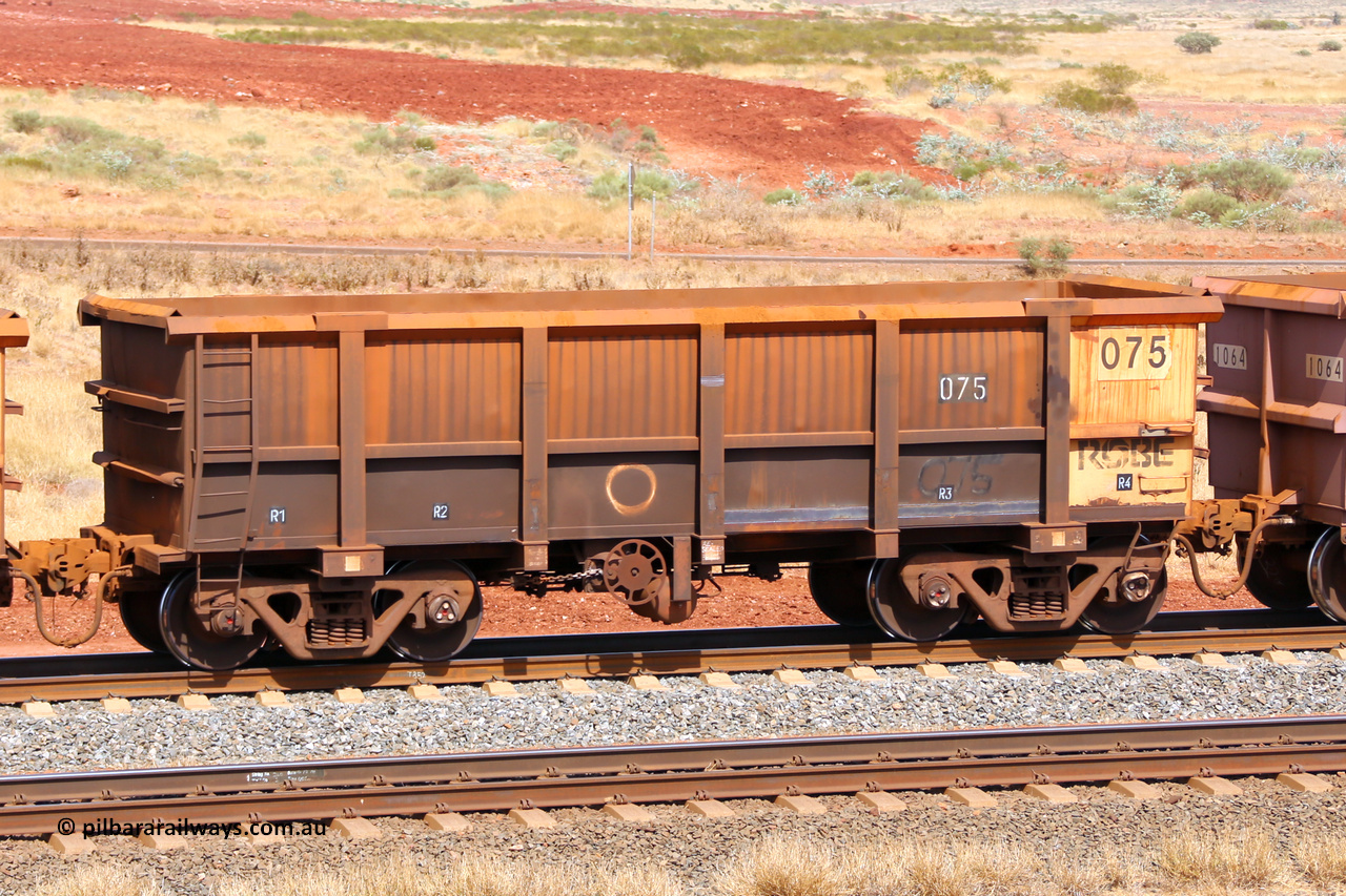 0075 141124 6868
Robe River ore waggon 075, built by Nippon Sharyo Nihon, fixed coupler handbrake side empty view at the 25 km at Arches Siding on the Cape Lambert line. November 24, 2014.
Keywords: 075;Nippon-Sharyo-Nihon;Robe-ore-waggon;
