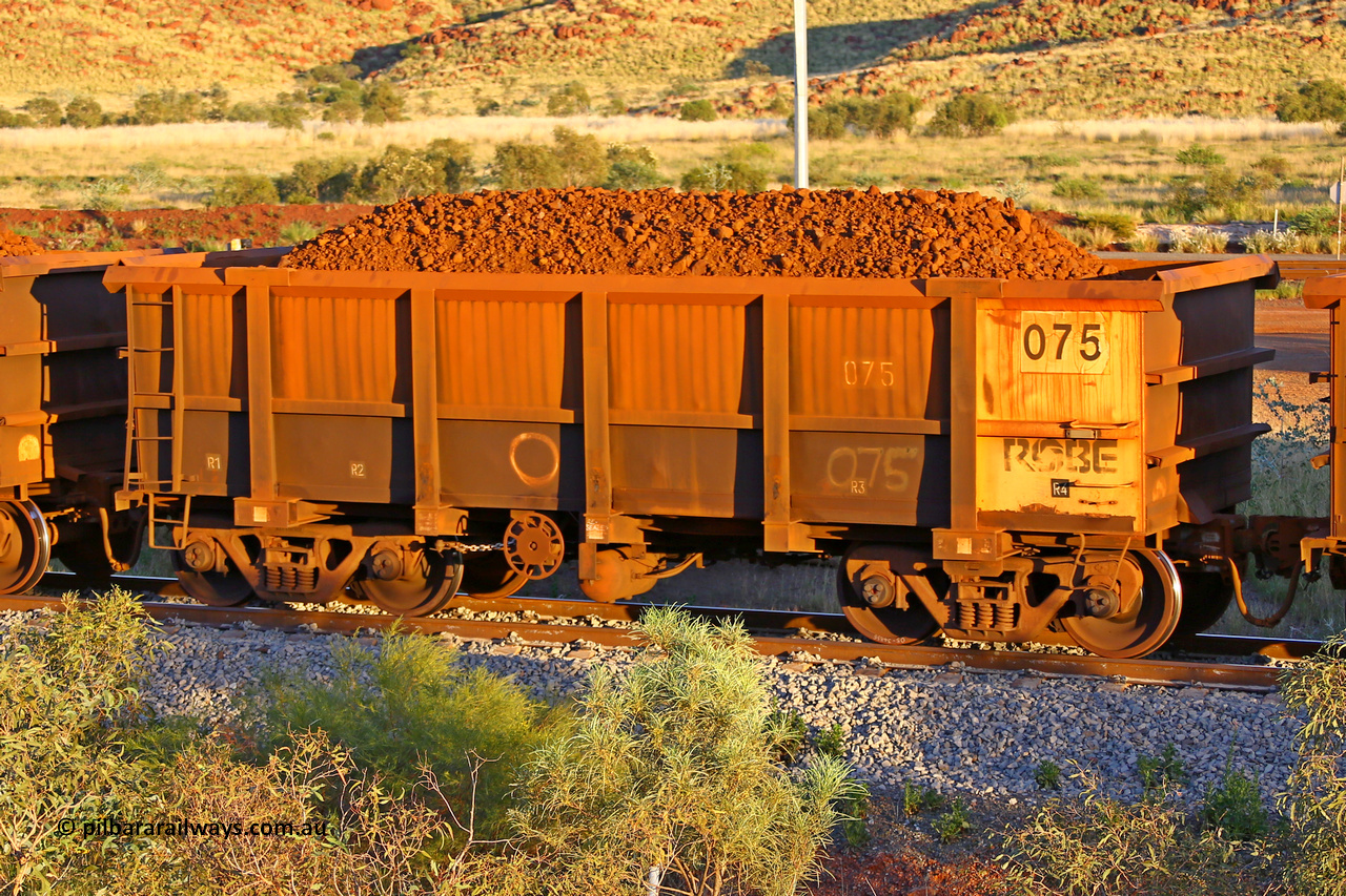0075 170513 8630
Robe River ore waggon 075, built by Nippon Sharyo Nihon, handbrake side loaded view, Cape Lambert yard, May 13, 2017.
Keywords: 075;Nippon-Sharyo-Nihon;Robe-ore-waggon;