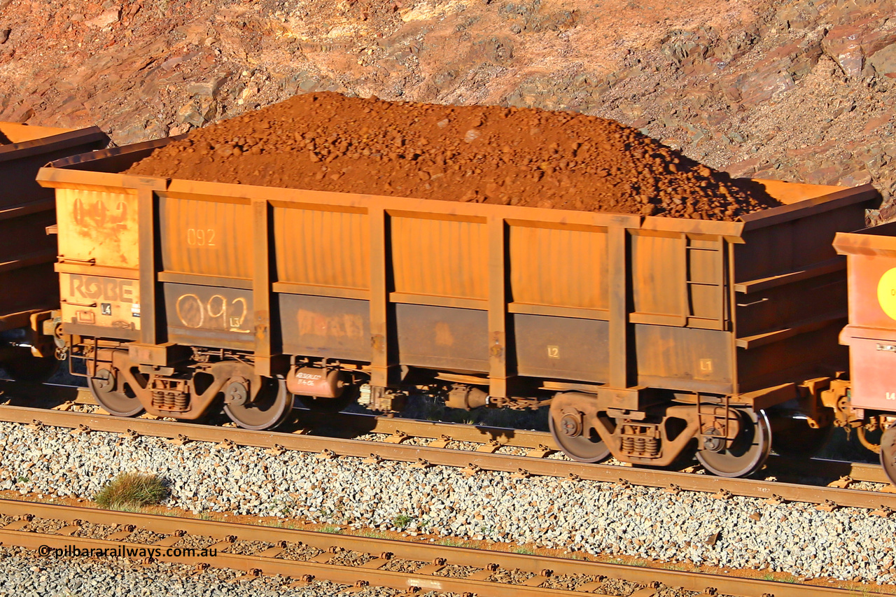 0092 180616 1642
Robe River ore waggon 092, built by Nippon Sharyo Nihon, fixed coupler non-handbrake side loaded view at the 38.5 km, Harding on the Cape Lambert line, June 16, 2018.
Keywords: 092;Nippon-Sharyo-Nihon;Robe-ore-waggon;
