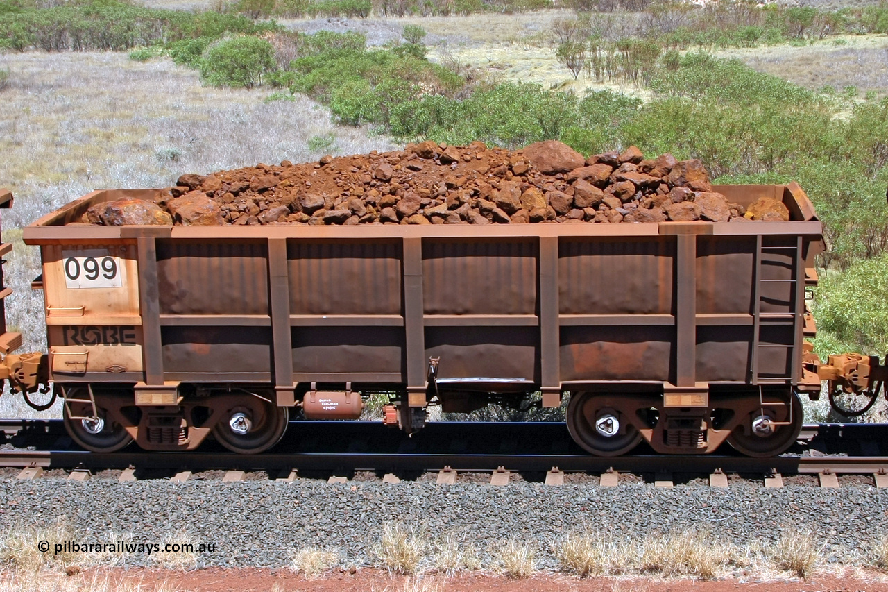 0099 081209 0150
Robe River ore waggon 099, built by Nippon Sharyo Nihon, non-handbrake side loaded view at the 7 km location just south of Cape Lambert yard. December 9, 2008.
Keywords: 099;Nippon-Sharyo-Nihon;Robe-ore-waggon;
