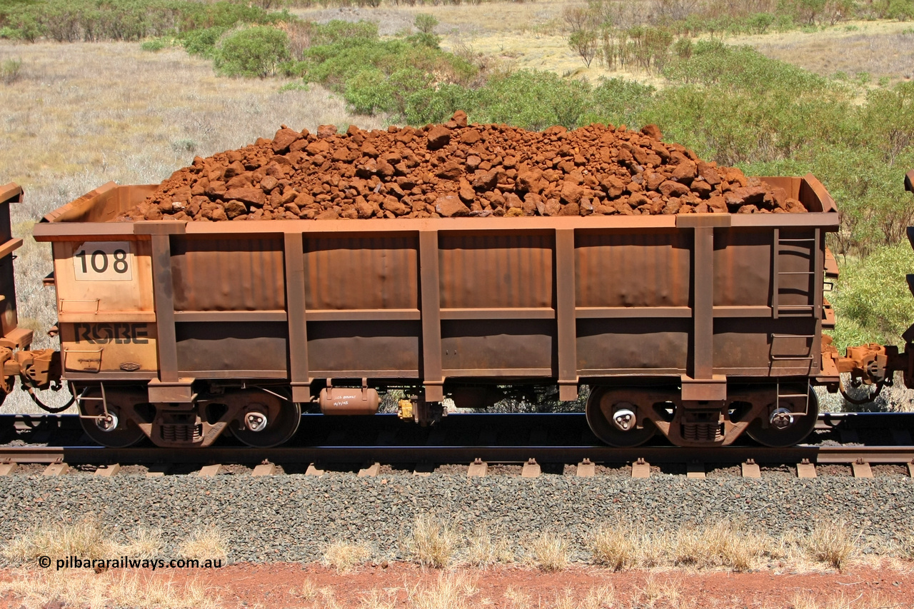 0108 081209 0137
Robe River ore waggon 108, built by Nippon Sharyo Nihon, rotary coupler end and plate detail loaded view at the 7 km location just south of Cape Lambert yard. December 9, 2008.
Keywords: 108;Nippon-Sharyo-Nihon;Robe-ore-waggon;