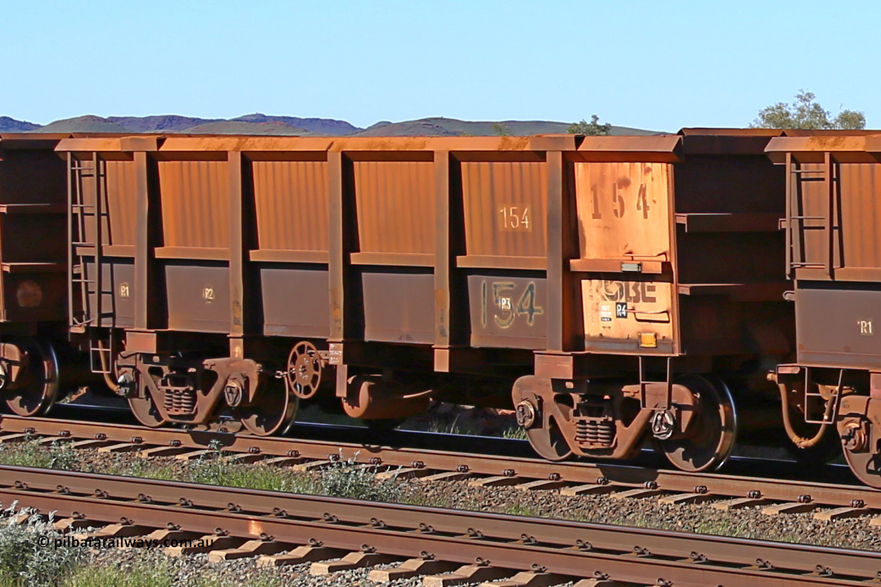 0154 160727 0969
Robe River ore waggon 154, built by Centurion Industries WA as a replacement, plate marking is visible, rotary coupler end handbrake side empty view at Harding Siding on the Cape Lambert line, July 27, 2016.
Keywords: 154;Centurion-Industries-WA;Robe-ore-waggon;