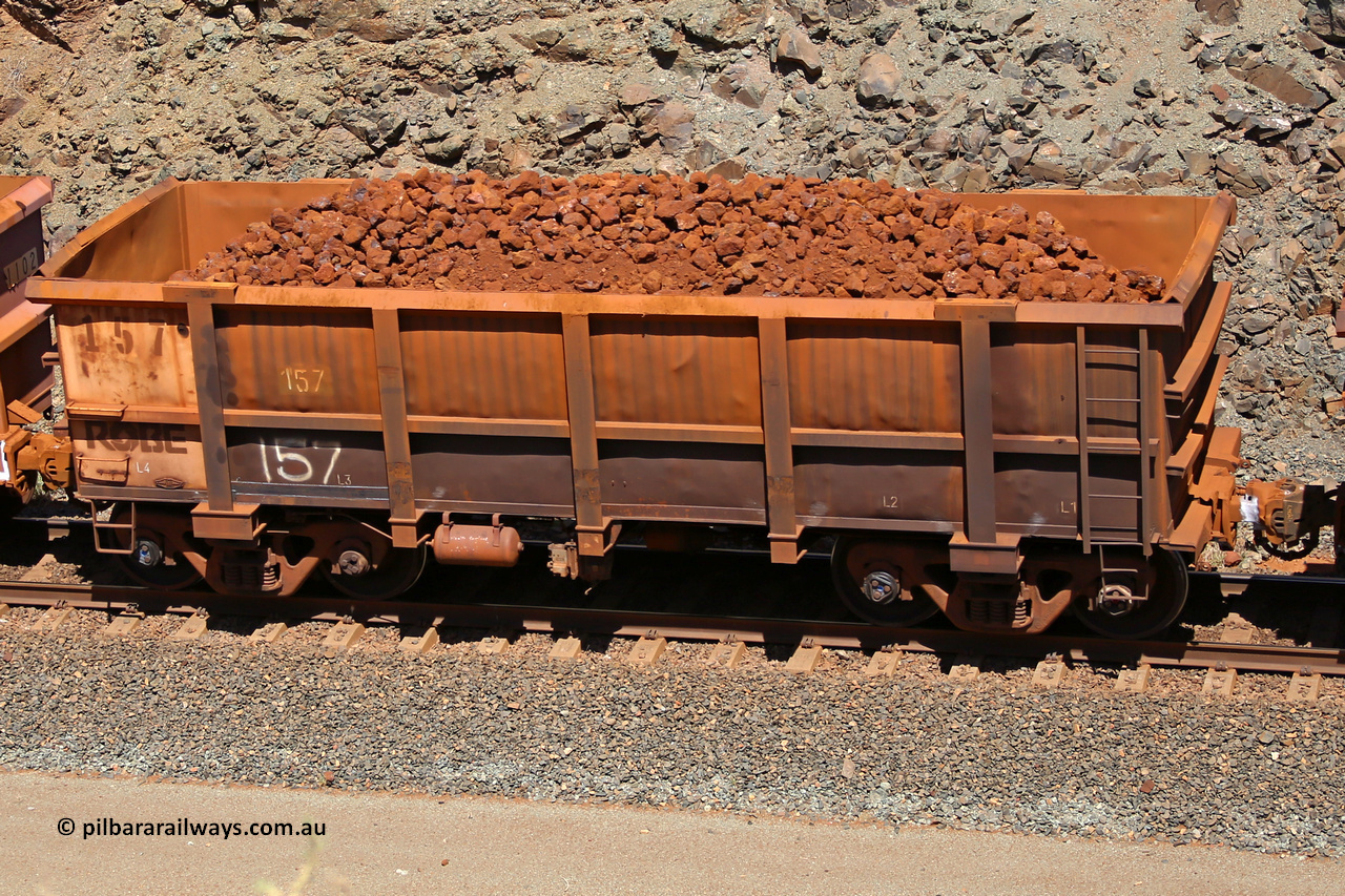 0157 160306 1672
Robe River ore waggon 157, built by Nippon Sharyo Nihon, fixed coupler non-handbrake side loaded view at the 45 km, Harding Siding on the Cape Lambert line. March 6, 2016.
Keywords: 157;Nippon-Sharyo-Nihon;Robe-ore-waggon;