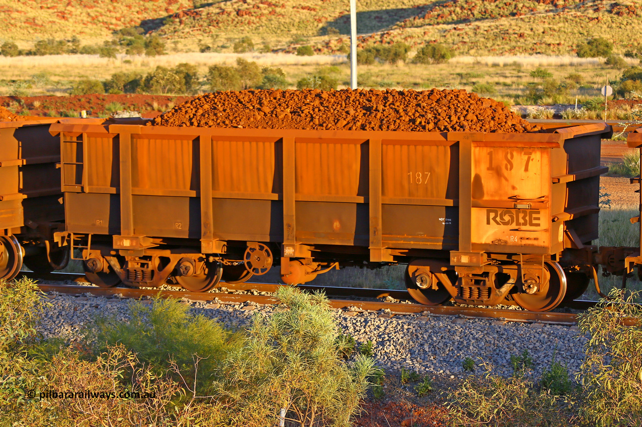 0187 170513 8635
Robe River ore waggon 187, built by Nippon Sharyo Nihon, rotary coupler end handbrake side loaded view, Cape Lambert yard, May 13, 2017.
Keywords: 187;Nippon-Sharyo-Nihon;Robe-ore-waggon;