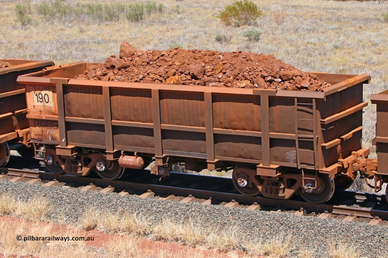 0190 081209 0162
Robe River ore waggon 190, built by Nippon Sharyo Nihon, fixed coupler non-handbrake side loaded view at the 7 km location just south of Cape Lambert yard. December 9, 2008.
Keywords: 190;Nippon-Sharyo-Nihon;Robe-ore-waggon;