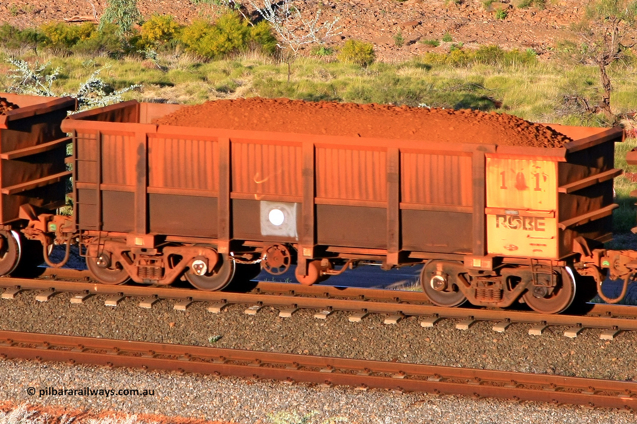 0191 110602 1737
Robe River ore waggon 191, built by Nippon Sharyo Nihon, rotary coupler end handbrake side loaded view at the 71 km, Western Creek on the Deepdale line. June 2, 2011.
Keywords: 191;Nippon-Sharyo-Nihon;Robe-ore-waggon;