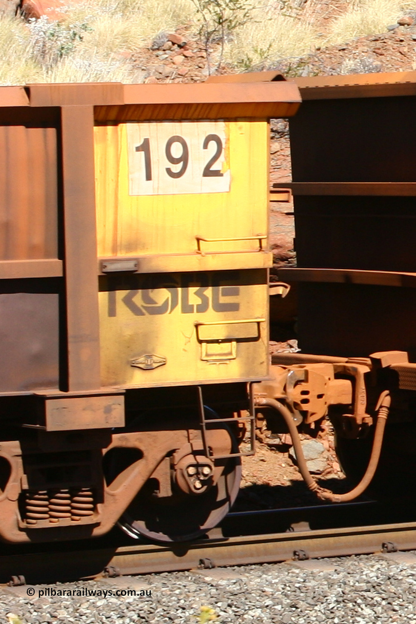 0192 060724 7915
Robe River ore waggon 192, built by Nippon Sharyo Nihon, rotary coupler end plate view at the 74 km, Western Creek on the Deepdale line. July 24, 2006.
Keywords: 192;Nippon-Sharyo-Nihon;Robe-ore-waggon;