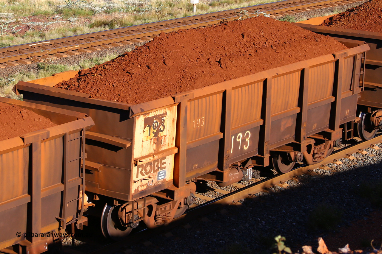 0193 210322 9734
Robe River ore waggon 193, built by Nippon Sharyo Nihon, rotary coupler end non-handbrake side loaded view at the 17 km on the Cape Lambert line, March 22, 2021.
Keywords: 193;Nippon-Sharyo-Nihon;Robe-ore-waggon;
