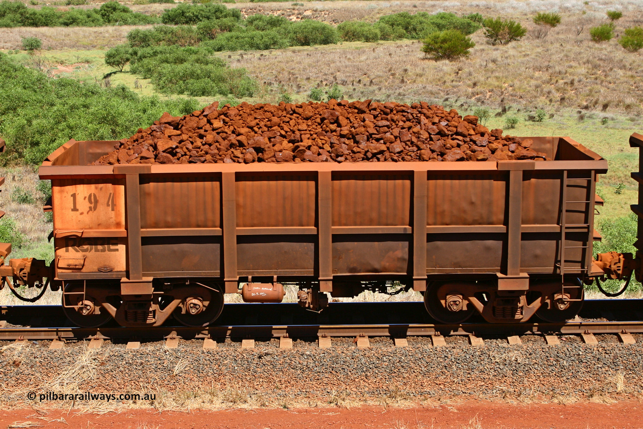 0194 061209 8182
Robe River ore waggon 194, built by Nippon Sharyo Nihon, non-handbrake side loaded view at the 7 km location just south of Cape Lambert yard. December 9, 2006.
Keywords: 194;Nippon-Sharyo-Nihon;Robe-ore-waggon;