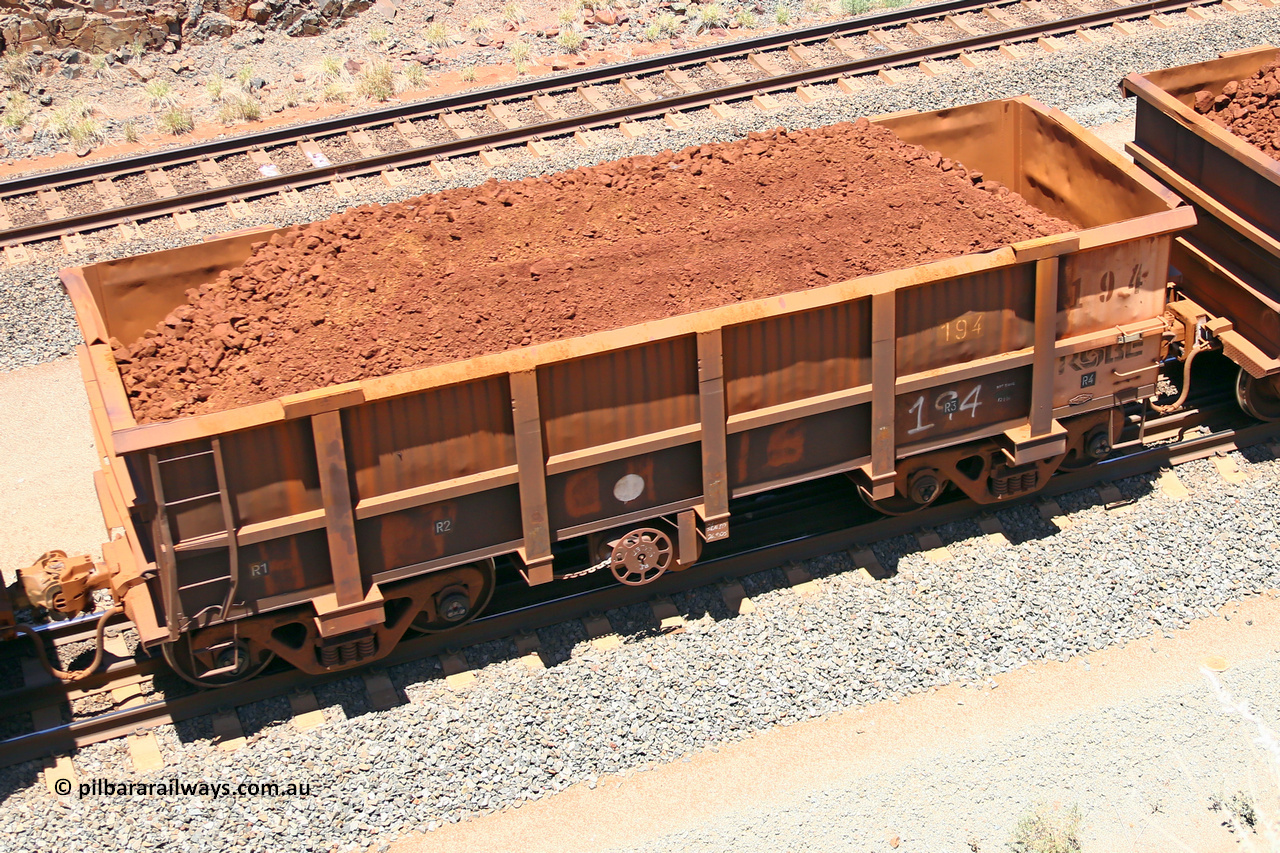 0194 160306 1456
Robe River ore waggon 194, built by Nippon Sharyo Nihon, fixed coupler handbrake side loaded view at the 45 km, Harding Siding on the Cape Lambert line. March 6, 2016.
Keywords: 194;Nippon-Sharyo-Nihon;Robe-ore-waggon;