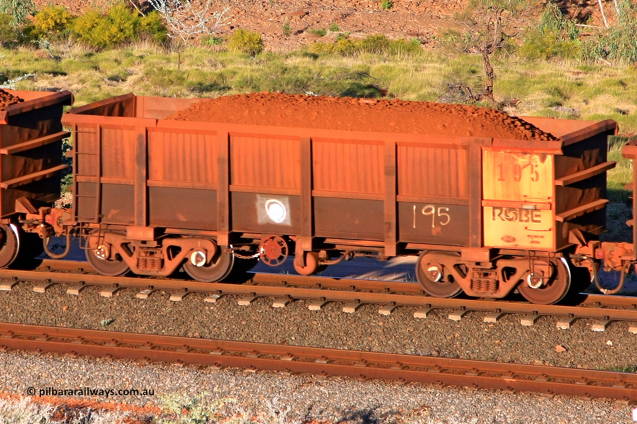 0195 110602 1734
Robe River ore waggon 195, built by Nippon Sharyo Nihon, rotary coupler end handbrake side loaded view at the 71 km, Western Creek on the Deepdale line. June 2, 2011.
Keywords: 195;Nippon-Sharyo-Nihon;Robe-ore-waggon;