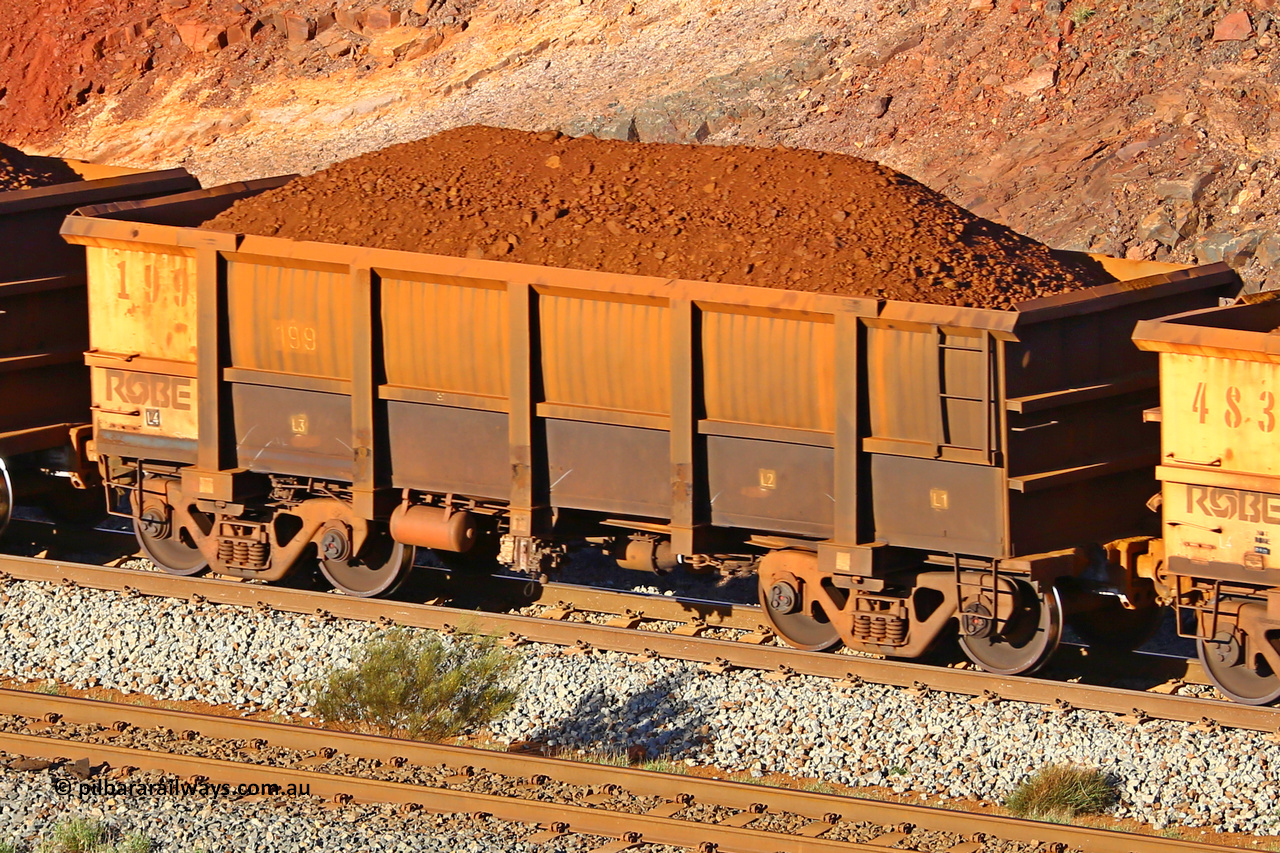 0199 180616 1646
Robe River ore waggon 199, built by Nippon Sharyo Nihon, fixed coupler non-handbrake side loaded view at the 38.5 km, Harding on the Cape Lambert line, June 16, 2018.
Keywords: 199;Nippon-Sharyo-Nihon;Robe-ore-waggon;