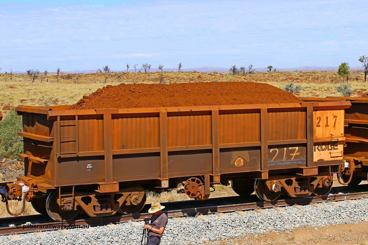 0217 170729 0277
Robe River ore waggon 217, built by Nippon Sharyo Nihon, fixed coupler handbrake side loaded view at the 103 km, between Maitland Siding and the Fortescue River on the Deepdale line. July 29, 2017.
Keywords: 217;Nippon-Sharyo-Nihon;Robe-ore-waggon;