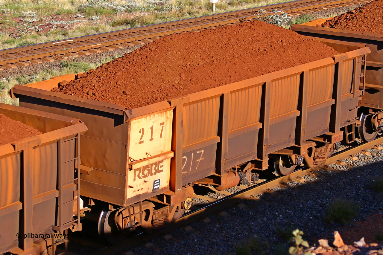 0217 210322 9743
Robe River ore waggon 217, built by Nippon Sharyo Nihon, rotary coupler end non-handbrake side loaded view at the 17 km on the Cape Lambert line, March 22, 2021.
Keywords: 217;Nippon-Sharyo-Nihon;Robe-ore-waggon;