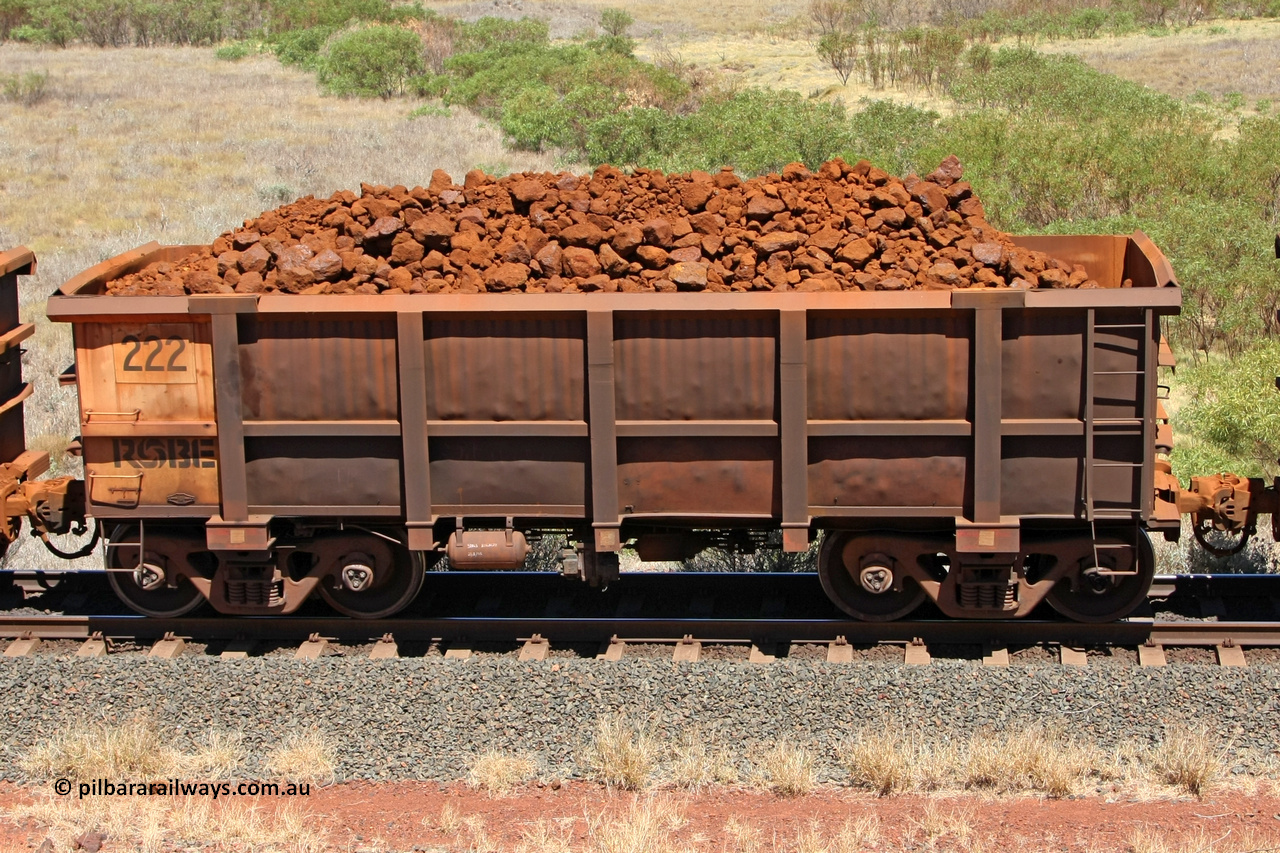 0222 081209 0136
Robe River ore waggon 222, built by Nippon Sharyo Nihon, non-handbrake side loaded view at the 7 km location just south of Cape Lambert yard. December 9, 2008.
Keywords: 222;Nippon-Sharyo-Nihon;Robe-ore-waggon;