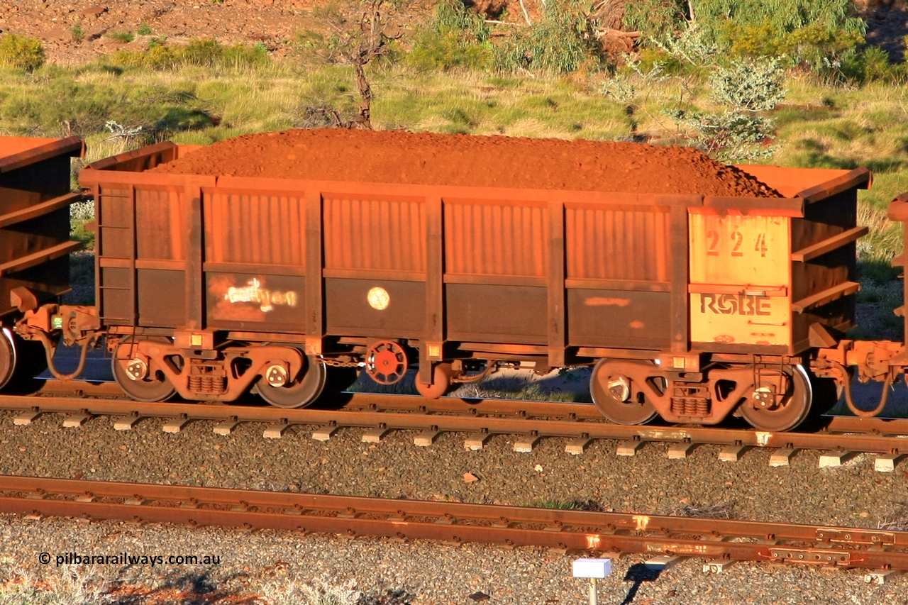 0224 110602 1641
Robe River ore waggon 224, built by Nippon Sharyo Nihon, rotary coupler end handbrake side loaded view at the 71 km, Western Creek on the Deepdale line. June 2, 2011.
Keywords: 224;Nippon-Sharyo-Nihon;Robe-ore-waggon;