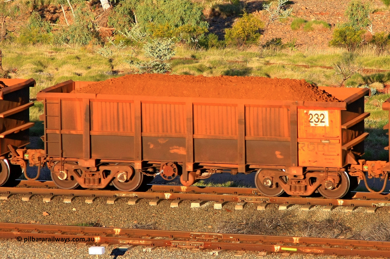 0232 110602 1669
Robe River ore waggon 232, built by Nippon Sharyo Nihon, rotary coupler end handbrake side loaded view at the 71 km, Western Creek on the Deepdale line. June 2, 2011.
Keywords: 232;Nippon-Sharyo-Nihon;Robe-ore-waggon;