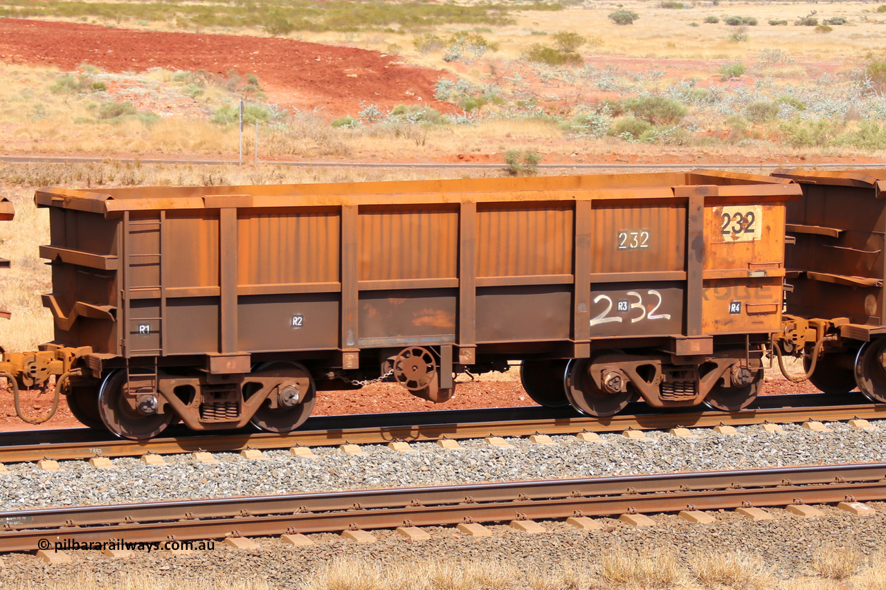0232 141124 6836
Robe River ore waggon 232, built by Nippon Sharyo Nihon, fixed coupler handbrake side empty view at the 25 km at Arches Siding on the Cape Lambert line. November 24, 2014.
Keywords: 232;Nippon-Sharyo-Nihon;Robe-ore-waggon;
