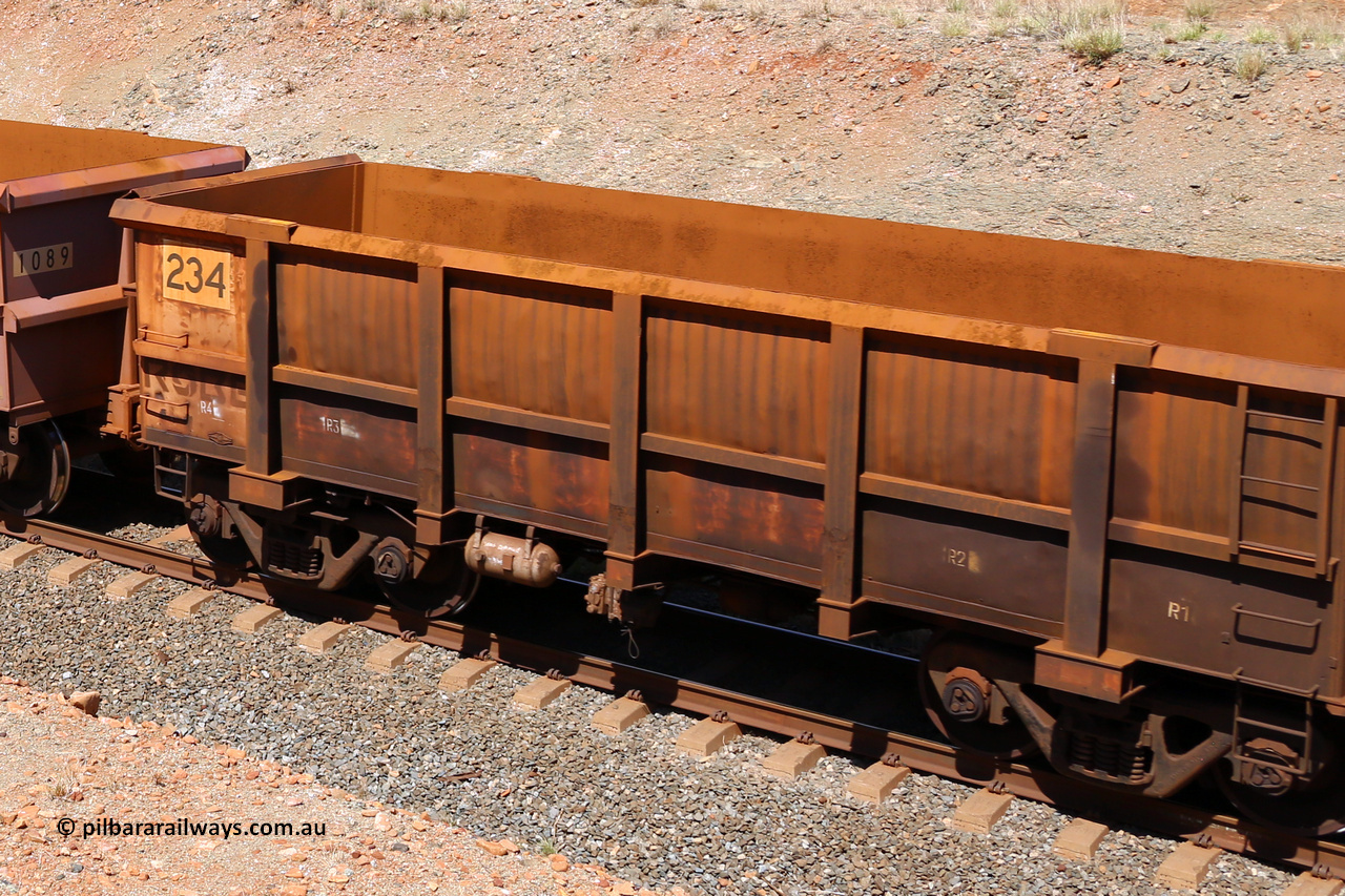 0234 160306 1321
Robe River ore waggon 234, built by Nippon Sharyo Nihon, fixed coupler non-handbrake side empty, partial view at Greenpool on the Cape Lambert line. March 6, 2016.
Keywords: 234;Nippon-Sharyo-Nihon;Robe-ore-waggon;