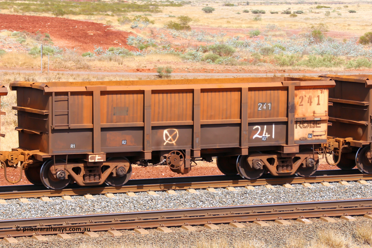 0241 141124 6794
Robe River ore waggon 241, built by Nippon Sharyo Nihon, fixed coupler handbrake side empty view at the 25 km at Arches Siding on the Cape Lambert line. November 24, 2014.
Keywords: 241;Nippon-Sharyo-Nihon;Robe-ore-waggon;