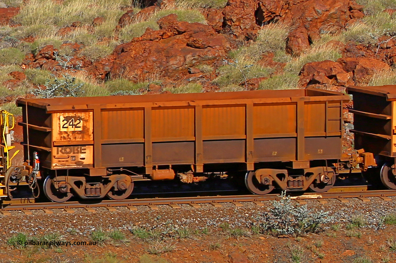 0242 180616 1690
Robe River ore waggon 242, built by Nippon Sharyo Nihon, rotary coupler end non-handbrake side empty view at the 38 km, Harding on the Cape Lambert line, June 16, 2018.
Keywords: 242;Nippon-Sharyo-Nihon;Robe-ore-waggon;