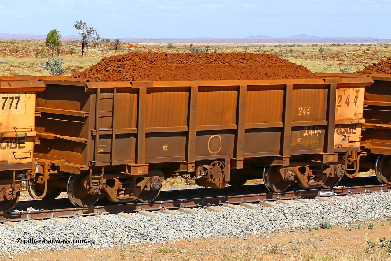 0244 170729 0244
Robe River ore waggon 244, built by Nippon Sharyo Nihon, fixed coupler handbrake side loaded view at the 103 km, between Maitland Siding and the Fortescue River on the Deepdale line. July 29, 2017.
Keywords: 244;Nippon-Sharyo-Nihon;Robe-ore-waggon;
