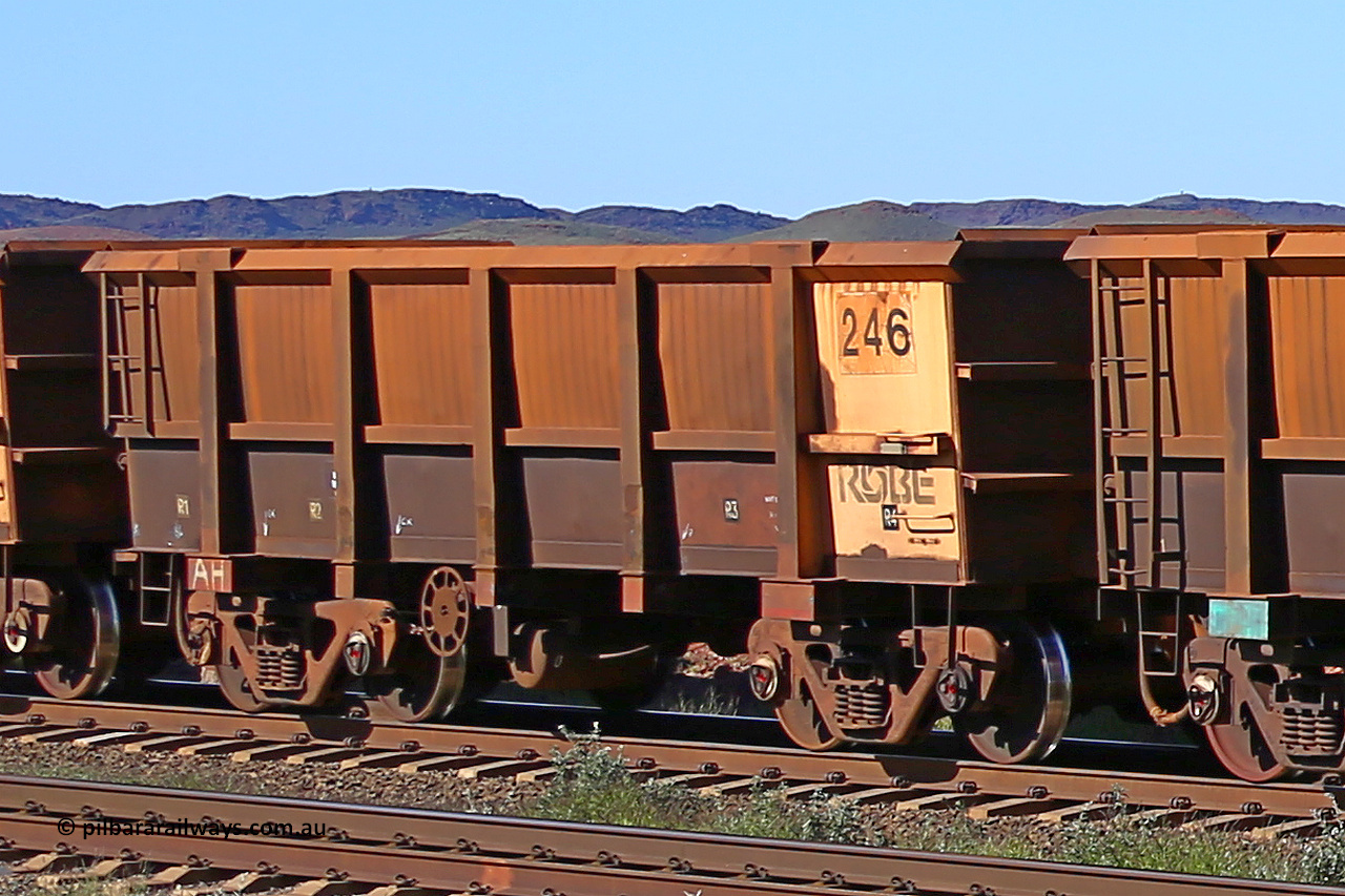 0246 160727 0988
Robe River ore waggon 246, built by Nippon Sharyo Nihon, rotary coupler end handbrake side empty view at Harding Siding on the Cape Lambert line, July 27, 2016.
Keywords: 246;Nippon-Sharyo-Nihon;Robe-ore-waggon;