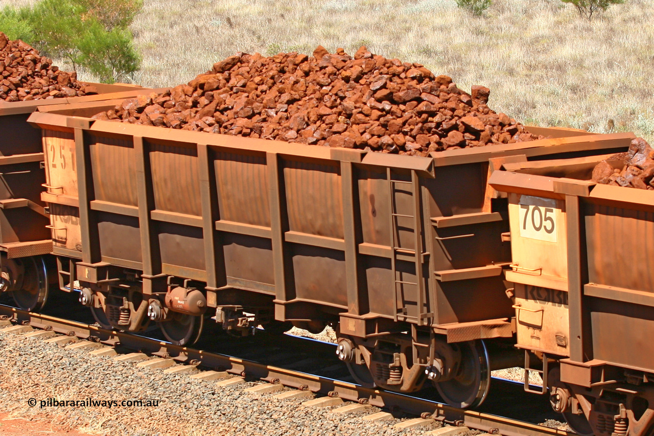 0257 061209 8178
Robe River ore waggon 257, built by Nippon Sharyo Nihon, fixed coupler non-handbrake side loaded view at the 7 km location just south of Cape Lambert yard. December 9, 2006.
Keywords: 257;Nippon-Sharyo-Nihon;Robe-ore-waggon;