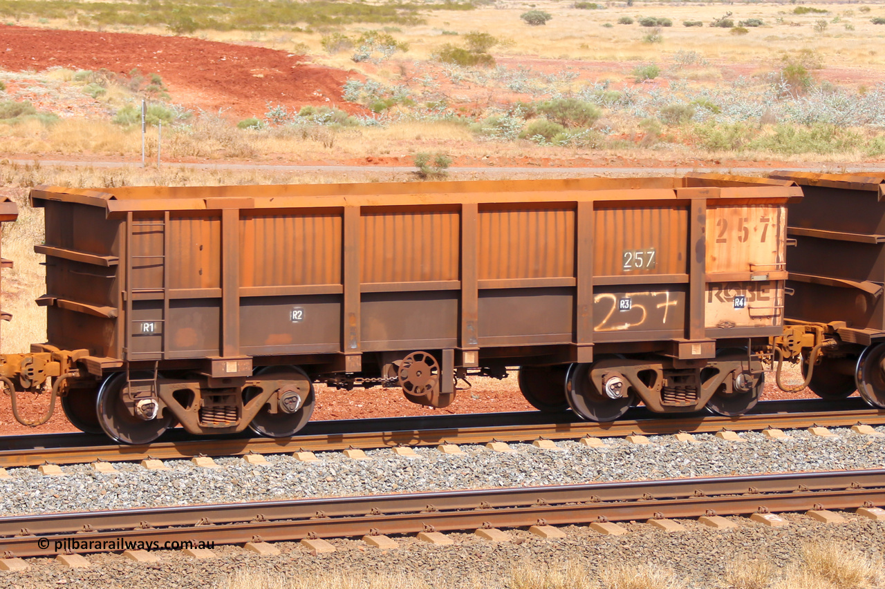 0257 141124 6815
Robe River ore waggon 257, built by Nippon Sharyo Nihon, fixed coupler handbrake side empty view at the 25 km at Arches Siding on the Cape Lambert line. November 24, 2014.
Keywords: 257;Nippon-Sharyo-Nihon;Robe-ore-waggon;