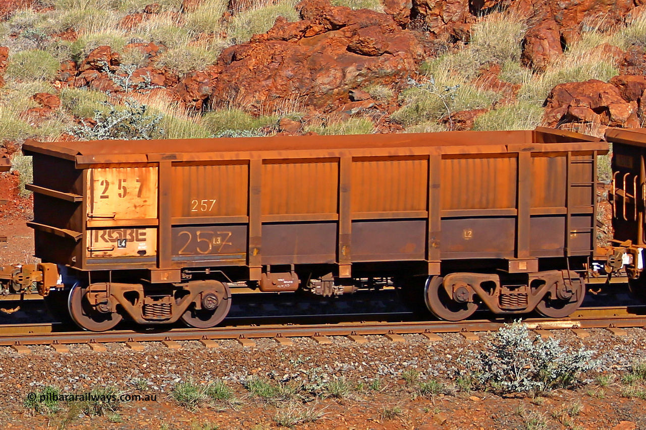 0257 180616 1696
Robe River ore waggon 257, built by Nippon Sharyo Nihon, rotary coupler end non-handbrake side empty view at the 38 km, Harding on the Cape Lambert line, June 16, 2018.
Keywords: 257;Nippon-Sharyo-Nihon;Robe-ore-waggon;