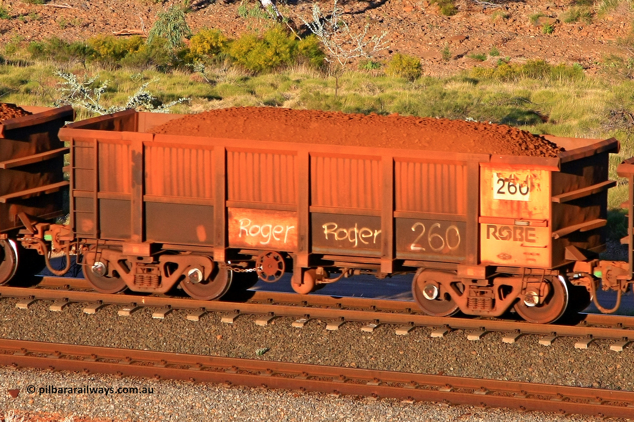 0260 110602 1725
Robe River ore waggon 260, built by Nippon Sharyo Nihon, rotary coupler end handbrake side loaded view at the 71 km, Western Creek on the Deepdale line. June 2, 2011.
Keywords: 260;Nippon-Sharyo-Nihon;Robe-ore-waggon;