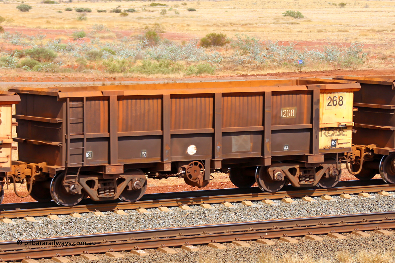 0268 141124 6772
Robe River ore waggon 268, built by Nippon Sharyo Nihon, fixed coupler handbrake side empty view at the 25 km at Arches Siding on the Cape Lambert line. November 24, 2014.
Keywords: 268;Nippon-Sharyo-Nihon;Robe-ore-waggon;